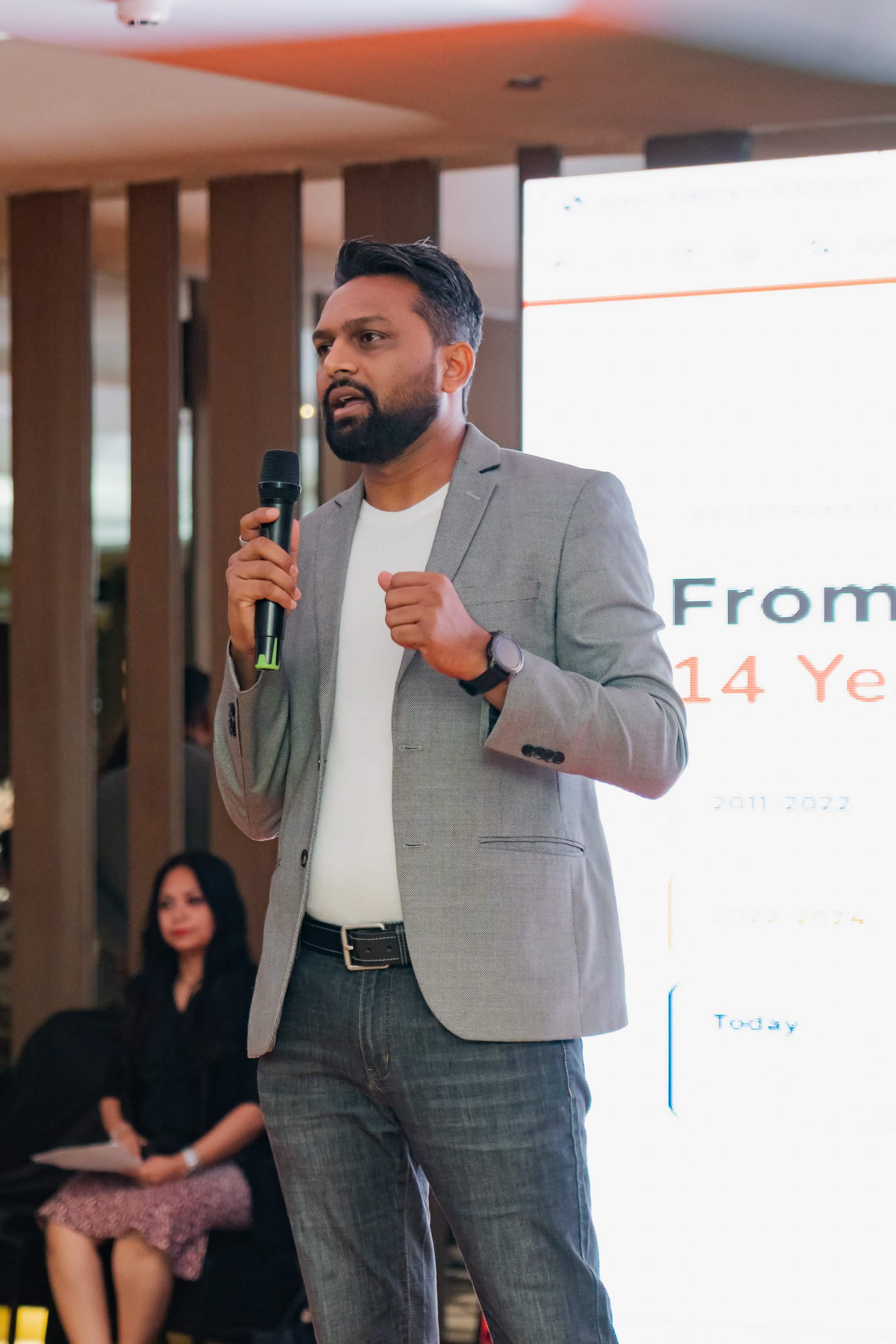 Avkash speaking at an event